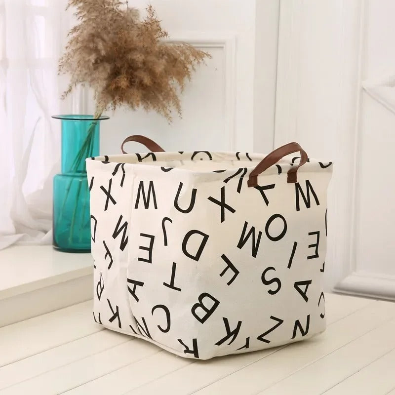 panier a linge avec motif alphabet